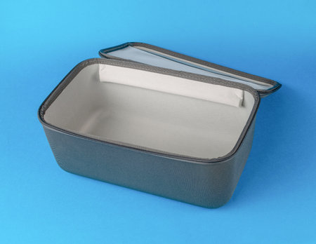 Empty Gray Storage Box on Blue Background for Organization and Minimalist Design Concepts