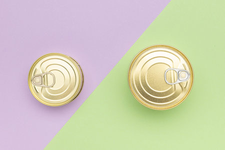 Minimalist Composition with Golden Can Tops on Pastel Background for Modern Stock Photography