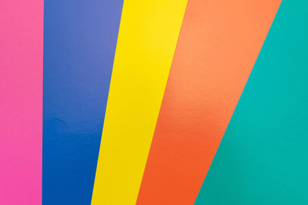 Vibrant Multicolored Abstract Background with Bold Geometric Paper Stripes