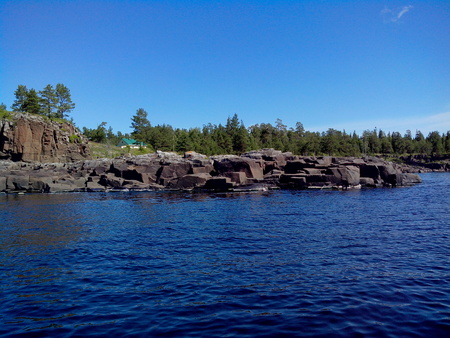 Mighty trees grow along the shores of Valaam Island. The wonderful island Valaam is located on Lake Lodozhskoye, Karelia. Balaam - a step to heaven.の写真素材