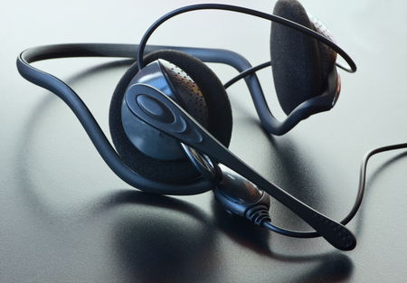 Headphones with a microphone.Headset.Tinted image.の写真素材