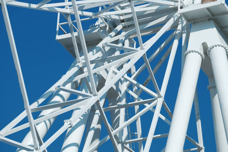 Metal constructions on the blue sky background.