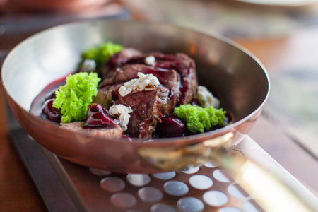 Meat in cherry sauceの写真素材