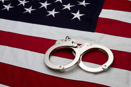 US Flag and Handcuffsの写真素材