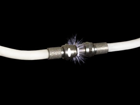 connection of cables is on a black background. An electric current flows on cables.の写真素材