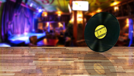 vinyl record retro sound on bar background with reflection on wood floor 3dの写真素材