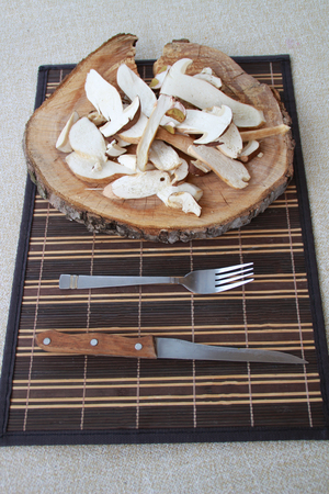 Photo of white mushrooms on table.の写真素材