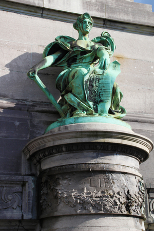 Photo of green sculpture of women in Brussels.の写真素材