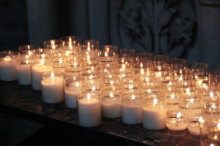 Photo of charch candles in cathedral of Saint Michaelin Brussels.の写真素材