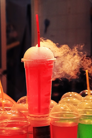 Photo of red coctail with smoke.の写真素材