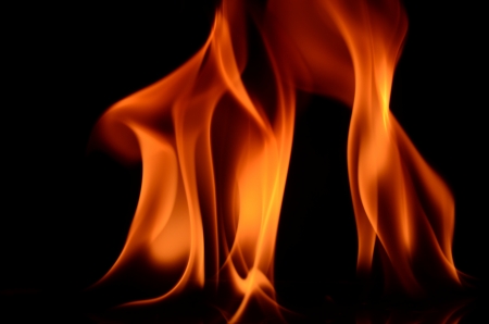 Fire flames on black background の写真素材