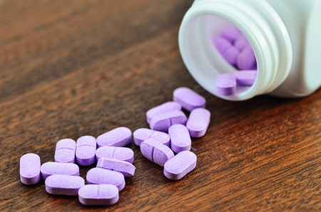 Pills spilling from Bottleの写真素材