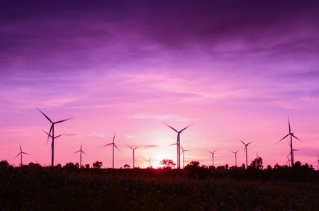 wind turbine at sunsetの写真素材