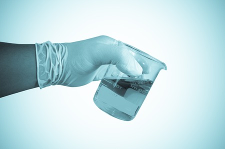 Scientist hand holding test tubes ,Laboratory research conceptの写真素材