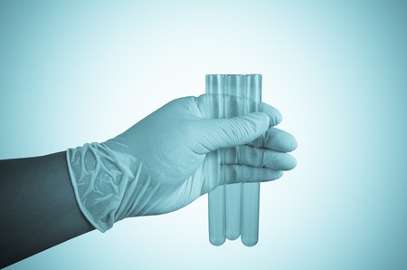 Scientist hand holding test tubes ,Laboratory research concept