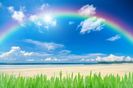 rainbow over blue skyの写真素材