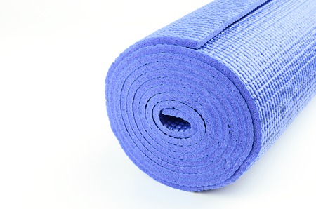 yoga mat for exercise on white backgroundの写真素材