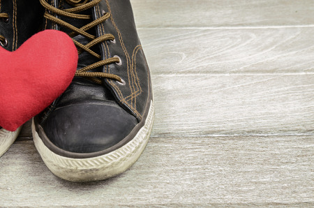 Shoes and red heart. Love themeの写真素材