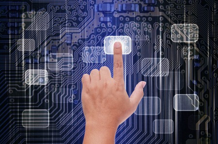 hand touch on virtual screenの写真素材