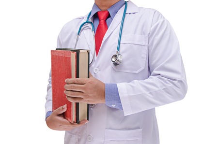 doctor and book in hand isolated on white backgroundの写真素材