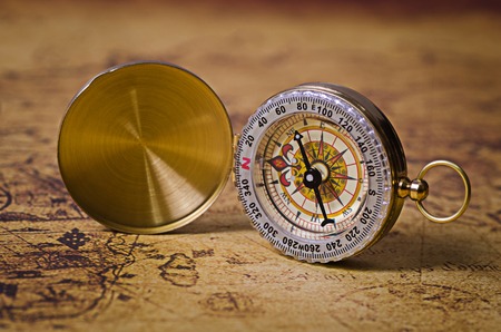 Compass on old mapの写真素材