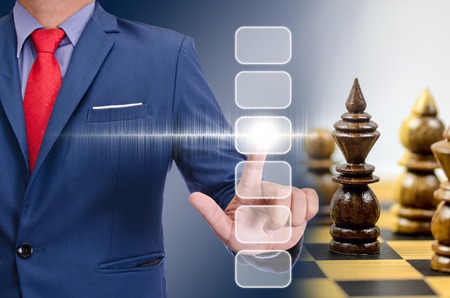 business man hand touching virtual screen