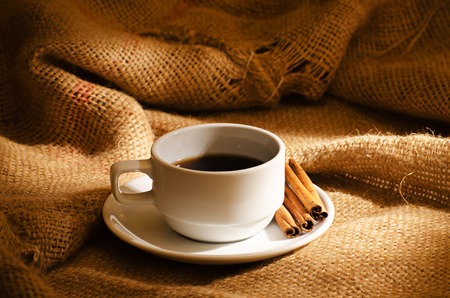 Coffee cup and coffee beans aroundの写真素材