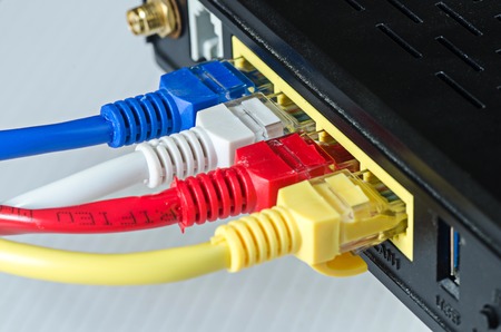 Ethernet cables connect to router or switchの写真素材