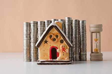 house model and stack of coinの写真素材