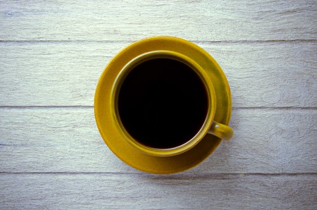 coffee cup on wooden tableの写真素材
