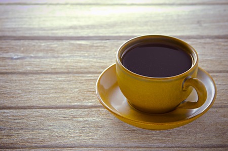 coffee cup on wooden tableの写真素材