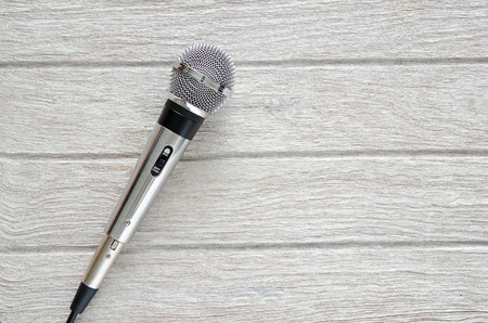 microphone on white wooden tableの写真素材