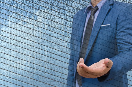 business man with modern building backgroundの写真素材