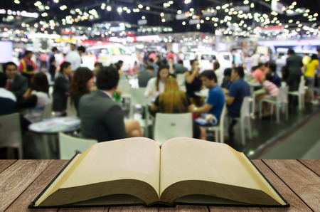 open book with blurred event backgroundの写真素材