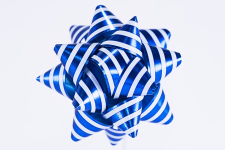 blue bow on white backgroundの写真素材