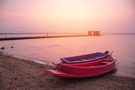 two boat in lake at the sunriseの写真素材