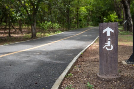 wheelchair sign road in the parkの写真素材
