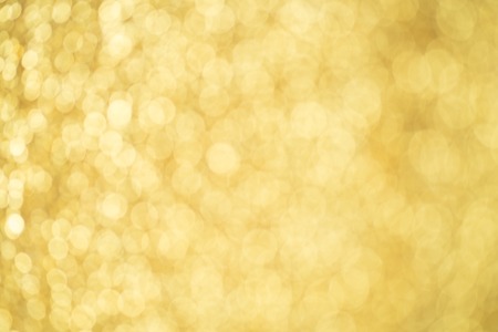 abstract gold bokeh backgroundの写真素材