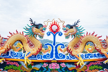 twin dragon on chinese temple roof topの写真素材