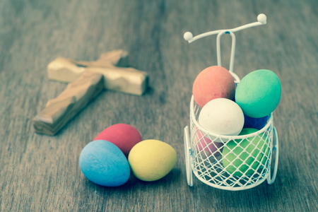 easter eggs decorated in white miniature bicycleの写真素材