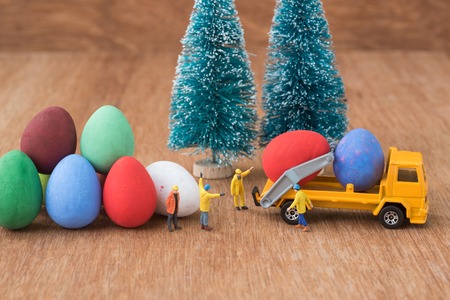 miniature working prepare easter eggs for decorationの写真素材