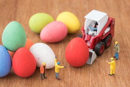 miniature working prepare easter eggs for decorationの写真素材