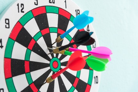 dart out of target red circle center of the target dartboardの写真素材