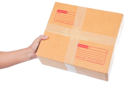 man hand holding package box isolated on white background