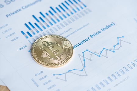 gold bitcoin on analysis graph , business conceptの写真素材