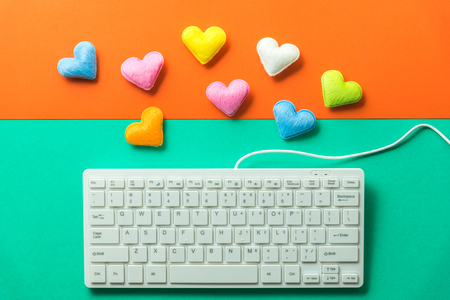 mini heart splash out from computer keyboard , valentine conceptの写真素材