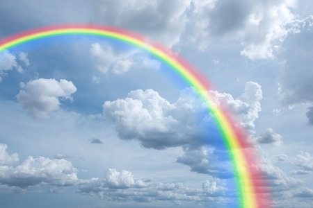 rainbow in cloudy sky for backgroundの写真素材