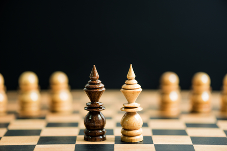 black against white king chess pieces on chess boardの写真素材