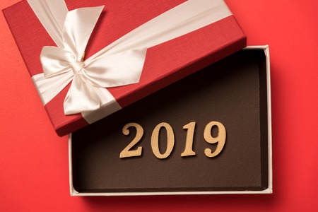 wood text year 2019 in open red gift box for happy new yearの写真素材