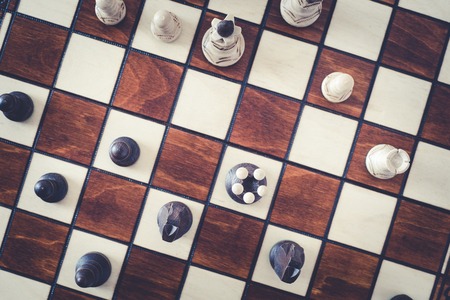 top view of chess pieces on a chessboard, business strategy conceptの写真素材
